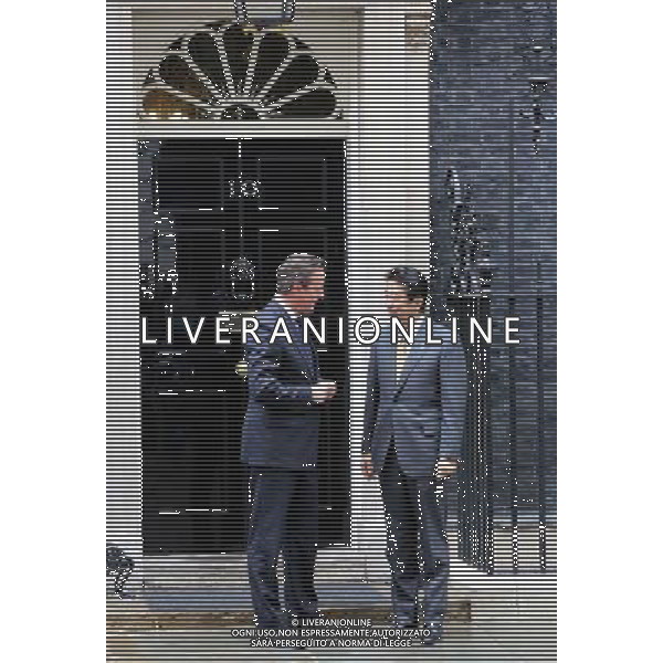 UK Prime Minister, David Cameron greets the Japanese Prime Minister Shinzo Abe as he arrives at 10 Downing Street in London, England on May 1, 2014. The Prime Minister of Japan has started a European tour to promote Japanese trade. AG ALDOL IVERANI SAS ONLY ITALY