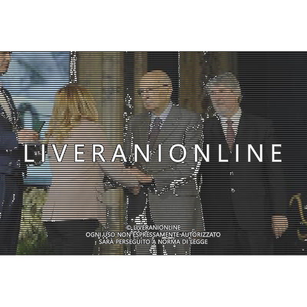 Roma - 01/05/2014 - Quirinale - Celebrazioni Festa del Lavoro - nella foto: Il presidente della Repubblica Giorgio Napolitano e il ministro del Lavoro Giuliano Poletti consegnano una onorificenza alla moglie di un caduto sul lavoro / Ph. Fabrizio Corradetti - Ag. Aldo Liverani sas