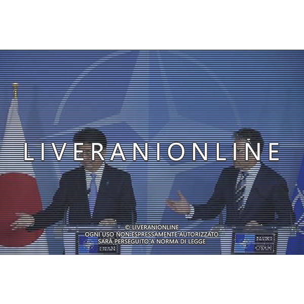(140506) -- BRUSSELS, May 6, 2014 () -- NATO Secretary General Anders Fogh Rasmussen (R) and Japan\'s Prime Minister Shinzo Abe attend a press conference after Abe\'s visit to its headquarters in Brussels, capital of Belgium, May 6, 2014. Japanese Prime Minister Shinzo Abe Tuesday signed an agreement with NATO Secretary General Anders Fogh Rasmussen to enhance the ties with the alliance, during his visit to the NATO headquarters in Brussels. (/Ye Pingfan) AG ALDO LIVERANI SAS ONLY ITALY