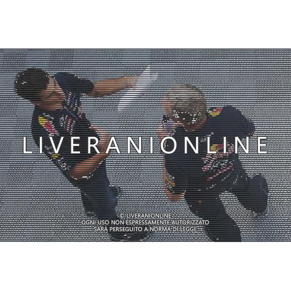 (L to R): Daniel Ricciardo (AUS) Red Bull Racing with Jonathan Wheatley (GBR) Red Bull Racing Team Manager. 08.05.2014. Formula 1 World Championship, Rd 5, Spanish Grand Prix, Barcelona, Spain, Preparation Day. - www.xpbimages.com, EMail: requests@xpbimages.com - copy of publication required for printed pictures. Every used picture is fee-liable. © Copyright: Photo4 / XPB Images AG ALDOLIVERANI SAS ONLY ITALY