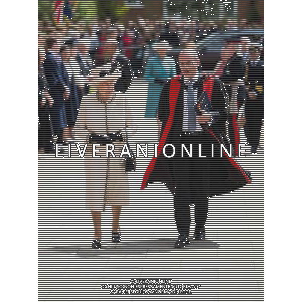 FELSTED, ENGLAND - MAY 06: Queen Elizabeth II walks with Headmaster Dr Michael Walker during an official visit to Felsted School on May 6, 2014 in Felsted, England. Her Majesty unveiled two plaques to commemorate the School\'s 450th anniversary and completion of a new boarding house. AG ALDO LIVERANI SAS ONLY ITALY
