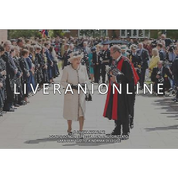 FELSTED, ENGLAND - MAY 06: Queen Elizabeth II walks with Headmaster Dr Michael Walker during an official visit to Felsted School on May 6, 2014 in Felsted, England. Her Majesty unveiled two plaques to commemorate the School\'s 450th anniversary and completion of a new boarding house. AG ALDO LIVERANI SAS ONLY ITALY