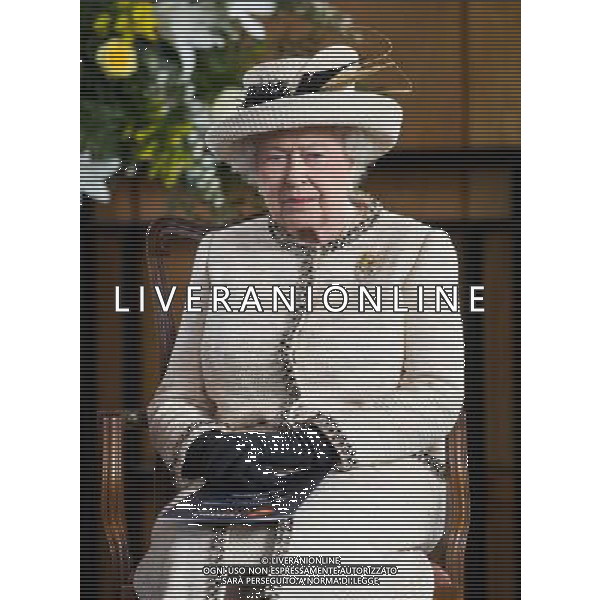 FELSTED, ENGLAND - MAY 06: Queen Elizabeth II looks on during an official visit to Felsted School on May 6, 2014 in Felsted, England. Her Majesty unveiled two plaques to commemorate the School\'s 450th anniversary and completion of a new boarding house. AG ALDO LIVERANI SAS ONLY ITALY