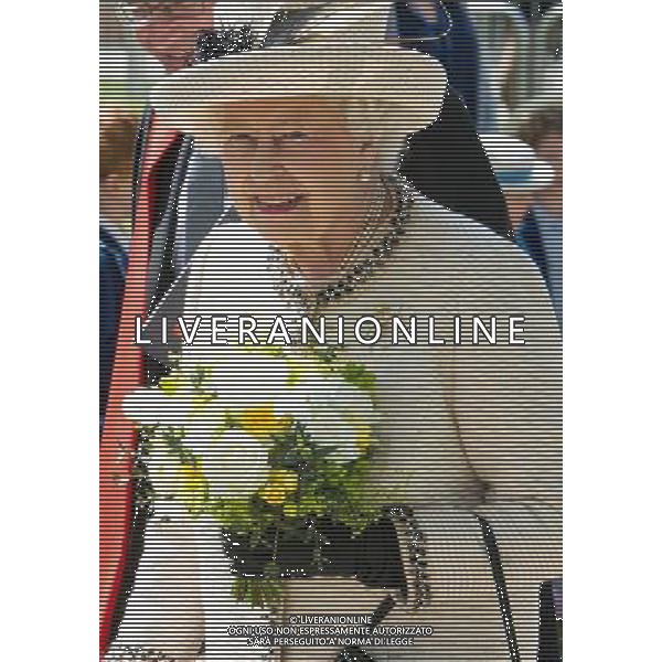 FELSTED, ENGLAND - MAY 06: Queen Elizabeth II departs after her official visit to Felsted School on May 6, 2014 in Felsted, England. Her Majesty unveiled two plaques to commemorate the School\'s 450th anniversary and completion of a new boarding house. AG ALDO LIVERANI SAS ONLY ITALY