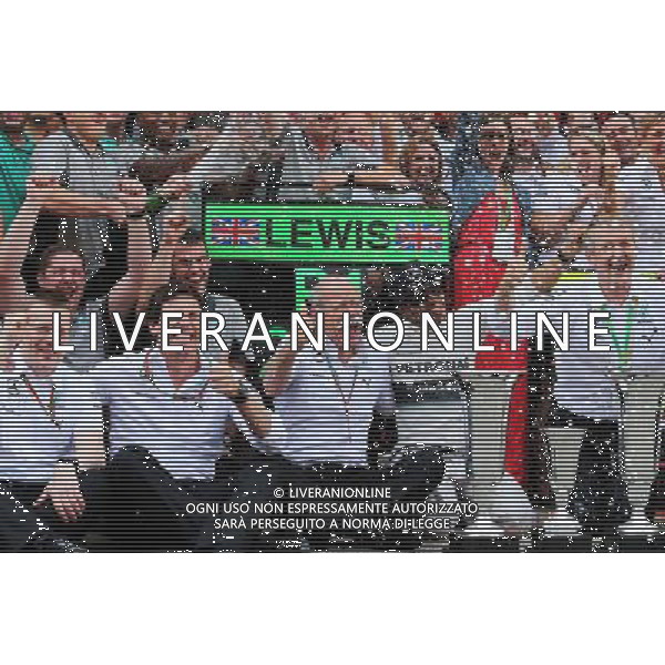 Race winner Nico Rosberg (GER) Mercedes AMG F1 celebrates with Toto Wolff (GER) Mercedes AMG F1 Shareholder and Executive Director, Dr. Dieter Zetsche (GER) Daimler AG CEO and the team. 11.05.2014. Formula 1 World Championship, Rd 5, Spanish Grand Prix, Barcelona, Spain, Race Day. - www.xpbimages.com, EMail: requests@xpbimages.com - copy of publication required for printed pictures. Every used picture is fee-liable. © Copyright: Moy / XPB Images AG ALDO LIVERANI SAS ONLY ITALY