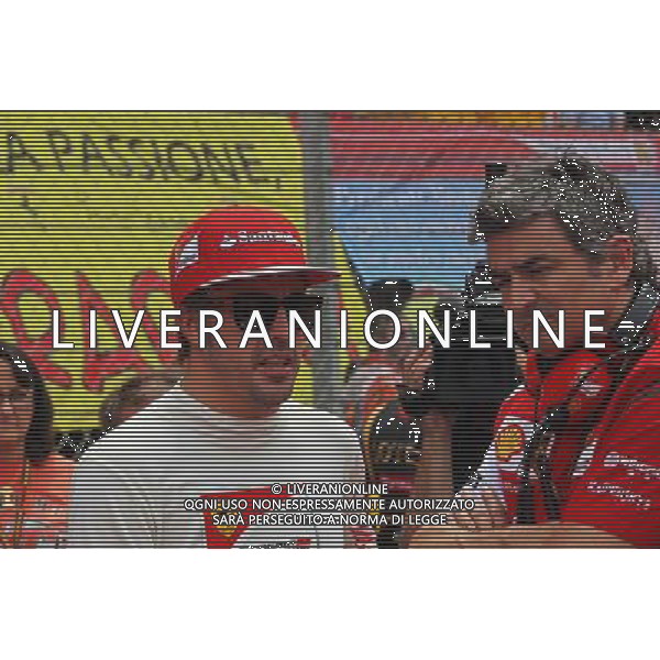 Fernando Alonso (ESP) Ferrari with Marco Mattiacci (ITA) Ferrari Team Principal on the grid. 11.05.2014. Formula 1 World Championship, Rd 5, Spanish Grand Prix, Barcelona, Spain, Race Day. - www.xpbimages.com, EMail: requests@xpbimages.com - copy of publication required for printed pictures. Every used picture is fee-liable. © Copyright: Photo4 / XPB Images AG ALDO LIVERANI SAS ONLY ITALY