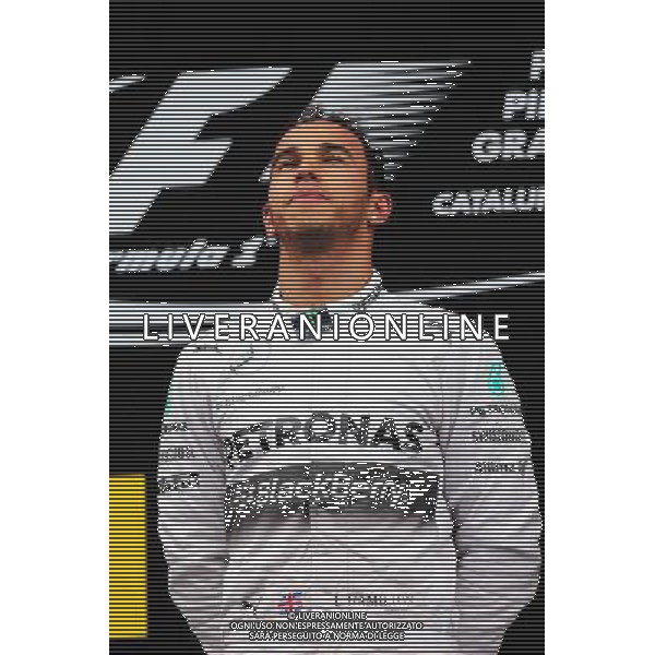 Race winner Lewis Hamilton (GBR) Mercedes AMG F1 celebrates on the podium. 11.05.2014. Formula 1 World Championship, Rd 5, Spanish Grand Prix, Barcelona, Spain, Race Day. - www.xpbimages.com, EMail: requests@xpbimages.com - copy of publication required for printed pictures. Every used picture is fee-liable. © Copyright: Moy / XPB Images AG ALDO LIVERANI SAS ONLY ITALY