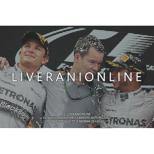 The podium (L to R): second placed Nico Rosberg (GER) Mercedes AMG F1 with Mike Elliot (GBR) Mercedes AMG F1 Head of Aero and race winner Lewis Hamilton (GBR) Mercedes AMG F1. 11.05.2014. Formula 1 World Championship, Rd 5, Spanish Grand Prix, Barcelona, Spain, Race Day. - www.xpbimages.com, EMail: requests@xpbimages.com - copy of publication required for printed pictures. Every used picture is fee-liable. © Copyright: Moy / XPB Images AG ALDO LIVERANI SAS ONLY ITALY