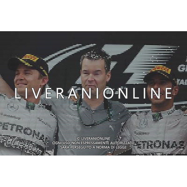 The podium (L to R): second placed Nico Rosberg (GER) Mercedes AMG F1 with Mike Elliot (GBR) Mercedes AMG F1 Head of Aero and race winner Lewis Hamilton (GBR) Mercedes AMG F1. 11.05.2014. Formula 1 World Championship, Rd 5, Spanish Grand Prix, Barcelona, Spain, Race Day. - www.xpbimages.com, EMail: requests@xpbimages.com - copy of publication required for printed pictures. Every used picture is fee-liable. © Copyright: Moy / XPB Images AG ALDO LIVERANI SAS ONLY ITALY