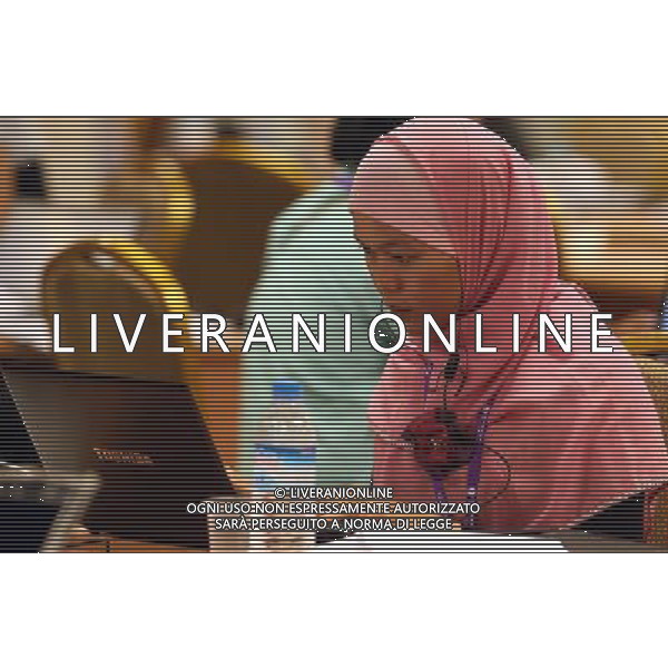 (140511) -- NAY PYI TAW, May 11, 2014 () -- A journalist works at Myanmar International Convention Center for the 24th ASEAN Summit in Nay Pyi Taw, Myanmar, May 11, 2014. (/Li Peng) (dzl) ©PHOTOSHOT/AGENZIA ALDO LIVERANI SAS - ITALY ONLY - EDITORIAL USE ONLY