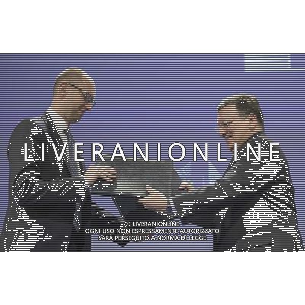 President Jose Manuel Barroso (R) and Ukrainian Prime Minister Arseniy Yatsenyuk are seen during the signarture ceremony of financing program for Ukraine at the end of EU commission / Urkraine meeting at the EU council headquarters in Brussels, Belgium on 13.05.2014 Yatsenyuk and his government hold talks with the European Commission to examine further support (Û355 million included in \'state building contract\') from the 28-nation bloc. by Wiktor Dabkowski AG ALDO LIVERANI SAS ONLY ITALY