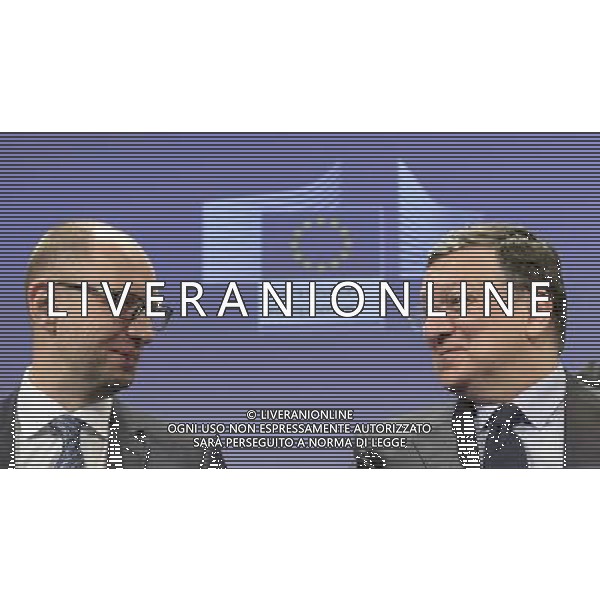 President Jose Manuel Barroso (R) and Ukrainian Prime Minister Arseniy Yatsenyuk are seen during the signarture ceremony of financing program for Ukraine at the end of EU commission / Urkraine meeting at the EU council headquarters in Brussels, Belgium on 13.05.2014 Yatsenyuk and his government hold talks with the European Commission to examine further support (€355 million included in \'state building contract\') from the 28-nation bloc. by Wiktor Dabkowski AG ALDO LIVERANI SAS ONLY ITALY