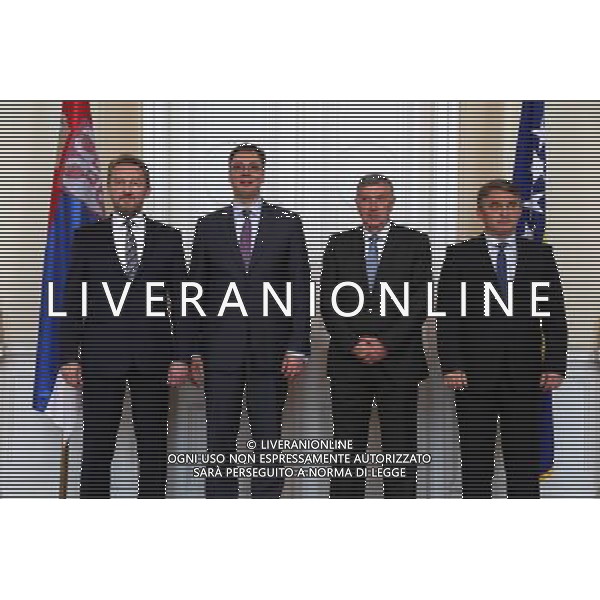 (140513) -- SARAJEVO, May 13, 2014 () -- Bosnia and Herzegovina (BiH) Chairman of Presidency Bakir Izetbegovic (1st L), BiH presidency member Nebojsa Radmanovic (2nd R) and Zeljko Komsic (1st R) pose for a photo with visiting Serbian Prime Minister Aleksandar Vucic (2nd L) in Sarajevo, BiH, on May 13, 2014. Visiting Serbian Prime Minister Aleksandar Vucic pledged on Tuesday to enhance bilateral ties with BiH during his meeting with BiH Prime Minister Vjekoslav Bevanda. (/Haris Memija) Â©photoshot/Agenzia Aldo Liverani sas - ITALY ONLY - Il premier serbo Aleksandar Vucic in visita per migliorare i legami bilaterali con la Bosnia-Erzegovina con il Primo Ministro BiH Vjekoslav Bevanda a Sarajevo, Bosnia-Erzegovina, il 13 maggio 2014.