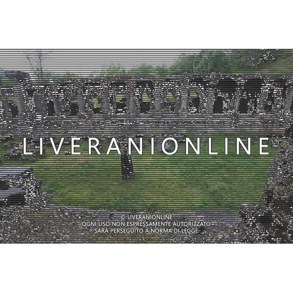 (140513) -- SRINAGAR, May 13, 2014 () -- Two Kashmiri men walk near the ruins of Martand Sun Temple in village Mattan of district Anantnag, about 65 km south of Srinagar, the summer capital of Indian-controlled Kashmir, May 12, 2014. Martand Sun Temple is one of the important archaeological sites in Indian-controlled Kashmir. The temple was built around 500 A.D. to be dedicated to Surya (Sun) god and is now in ruins. (/Javed Dar) ©photoshot/Agenzia Aldo Liverani sas - ITALY ONLY - Le rovine del Martand Tempio del Sole uno dei piu\' importanti siti archeologici nel villaggio Mattan del distretto di Anantnag, circa 65 km a sud di Srinagar, capitale estiva del indiano controllata Kashmir, 12 maggio 2014