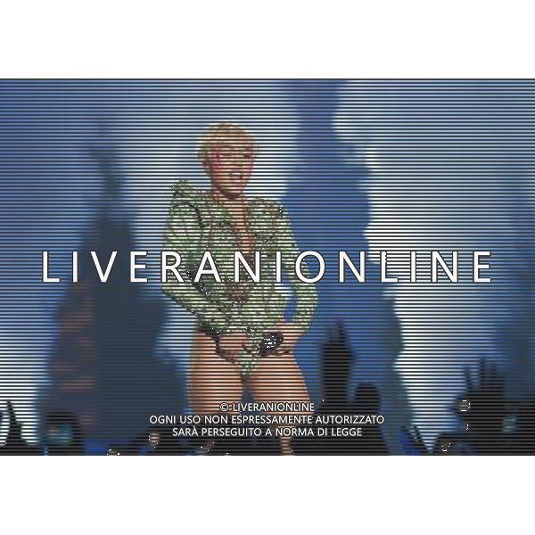 Miley Cyrus performing at Phone 4u Arena, Manchester, England on 14th May 2014. Â©Photoshot/Ag. Aldo Liverani s.a.s.-Only Italy-Editorial Use Only