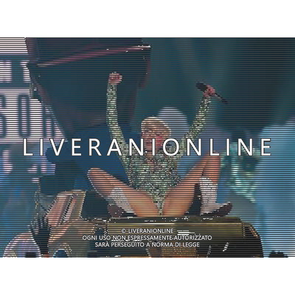 Miley Cyrus performing at Phone 4u Arena, Manchester, England on 14th May 2014. Â©Photoshot/Ag. Aldo Liverani s.a.s.-Only Italy-Editorial Use Only