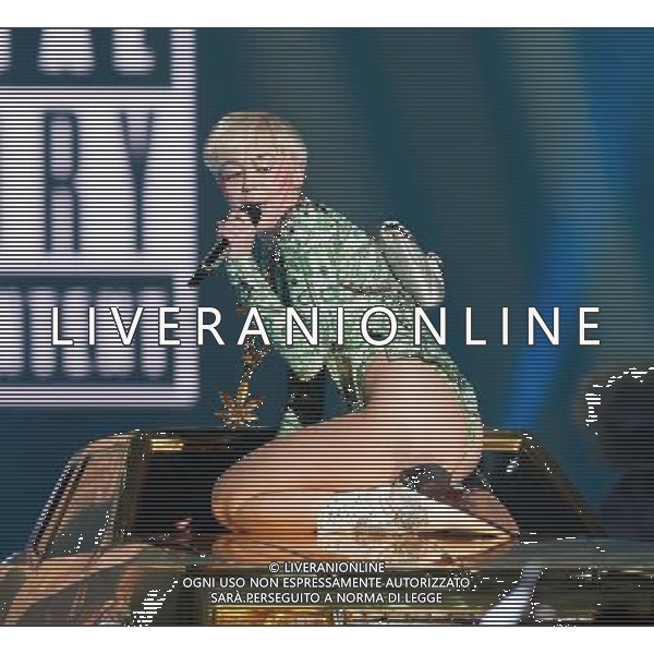 Miley Cyrus performing at Phone 4u Arena, Manchester, England on 14th May 2014. Â©Photoshot/Ag. Aldo Liverani s.a.s.-Only Italy-Editorial Use Only