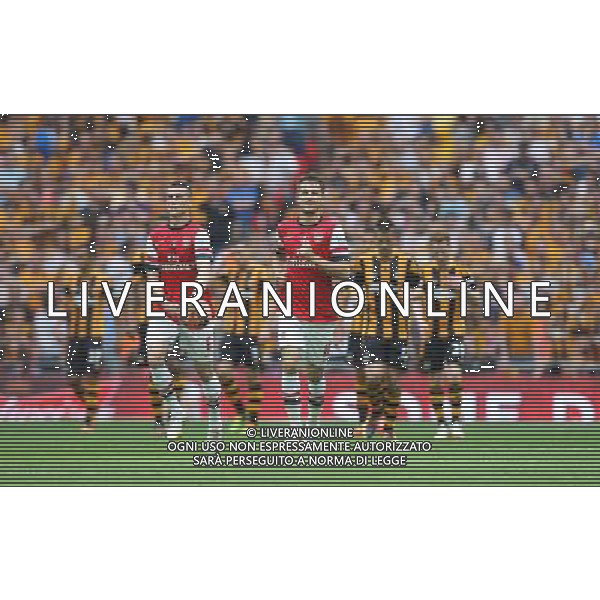 Arsenal celebrate Arsenal\'s Santi Cazorla\'s Goal 1-2 Photographer Karyn Haddon/CameraSport Football - FA Challenge Cup Final - Arsenal v Hull City - Saturday 17th May 2014 - Wembley Stadium - London Â© CameraSport - 43 Linden Ave. Countesthorpe. Leicester. England. LE8 5PG - Tel: +44 (0) 116 277 4147 - admin@camerasport.com - www.camerasport.com AG ALDOL IVERANI SAS ONLY ITALY