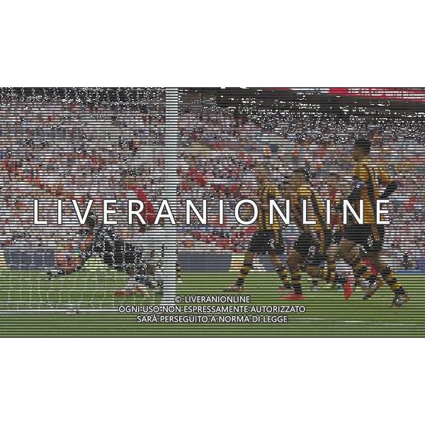 Arsenal\'s Laurent Koscielny scores his sides second goal 2-2 Photographer Karyn Haddon/CameraSport Football - FA Challenge Cup Final - Arsenal v Hull City - Saturday 17th May 2014 - Wembley Stadium - London Â© CameraSport - 43 Linden Ave. Countesthorpe. Leicester. England. LE8 5PG - Tel: +44 (0) 116 277 4147 - admin@camerasport.com - www.camerasport.com AG ALDOL IVERANI SAS ONLY ITALY