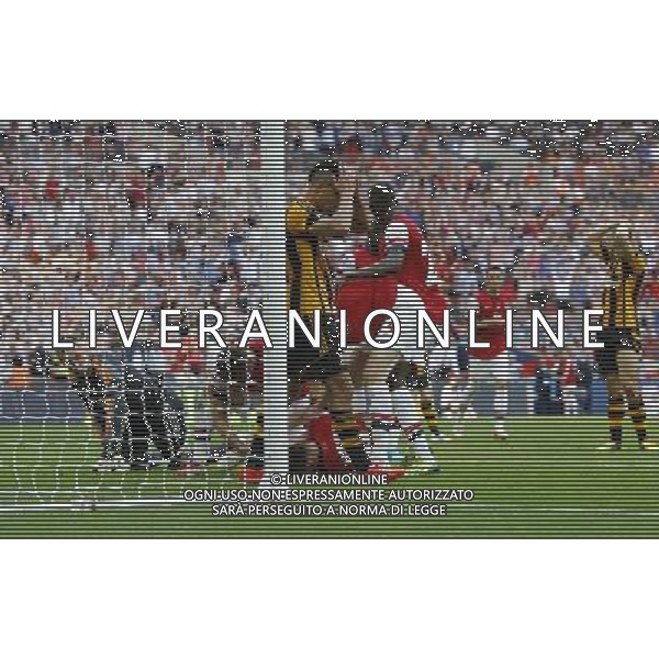 Arsenal\'s Laurent Koscielny scores his sides second goal 2-2 Photographer Karyn Haddon/CameraSport Football - FA Challenge Cup Final - Arsenal v Hull City - Saturday 17th May 2014 - Wembley Stadium - London Â© CameraSport - 43 Linden Ave. Countesthorpe. Leicester. England. LE8 5PG - Tel: +44 (0) 116 277 4147 - admin@camerasport.com - www.camerasport.com AG ALDOL IVERANI SAS ONLY ITALY
