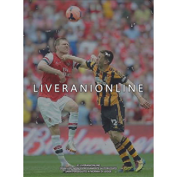 PER MERTESACKER \' MATTHEW FRYATT ARSENAL FC V HULL CITY FC ARSENAL FC V HULL CITY FC, THE BUDWEISER FA CUP FINAL WEMBLEY STADIUM, LONDON, ENGLAND 17 May 2014 GAU80877 THE BUDWEISER FA CUP FINAL 2014 WARNING! This Photograph May Only Be Used For Newspaper And/Or Magazine Editorial Purposes. May Not Be Used For Publications Involving 1 player, 1 Club Or 1 Competition Without Written Authorisation From Football DataCo Ltd. For Any Queries, Please Contact Football DataCo Ltd on +44 (0) 207 864 9121 ag aldo liverani sas only italy