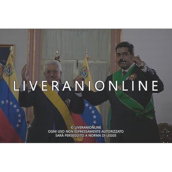 (140517) -- CARACAS, May 17, 2014 () -- Venezuelan President Nicolas Maduro (R) and Palestinian President Mahmoud Abbas pose after receiving the commendations Palestine Star by Abbas and Francisco de Miranda order from Maduro, in Miraflores Palace in Caracas, Venezuela, on May 16, 2014. Mahmoud Abbas is making an official visit to Venezuela from May 15 to 17. (/Boris Vergara) AG ALDOL IVERANI SAS ONLY ITALY