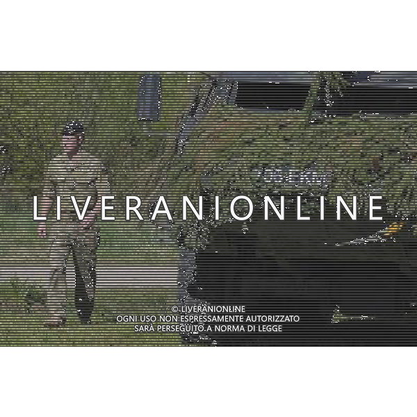 (140517) -- POLGASTE, May 17, 2014 () -- Britain\'s Prince Harry walks beside a armored vehicle on May 17, 2014 during a visit to the Estonian Defence Forces annual pring Stormtraining exercises held near Polgaste, not far from Estonian-Russian border in South Estonia. (/Sergei Stepanov) AG ALDO LIVERANI SAS ONLY ITALY