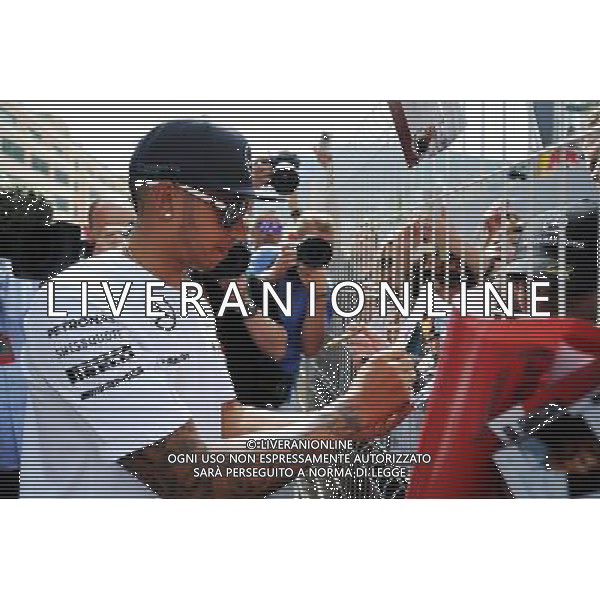Lewis Hamilton (GBR) Mercedes AMG F1 signs autographs for the fans. 21.05.2014. Formula 1 World Championship, Rd 6, Monaco Grand Prix, Monte Carlo, Monaco, Preparation Day. - www.xpbimages.com, EMail: requests@xpbimages.com - copy of publication required for printed pictures. Every used picture is fee-liable. © Copyright: Price / XPB Images AG ALDO LIVERANI SAS ONLY ITALY