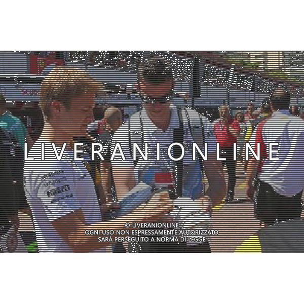 Nico Rosberg (GER) Mercedes AMG F1 signs autographs for the fans. 23.05.2014. Formula 1 World Championship, Rd 6, Monaco Grand Prix, Monte Carlo, Monaco, Friday. - www.xpbimages.com, EMail: requests@xpbimages.com - copy of publication required for printed pictures. Every used picture is fee-liable. Â© Copyright: Batchelor / XPB Images /AGENZIA ALDO LIVERANI SAS - ITALY ONLY - EDITORIAL USE ONLY - GP MONACO F1 PROVE LIBERE