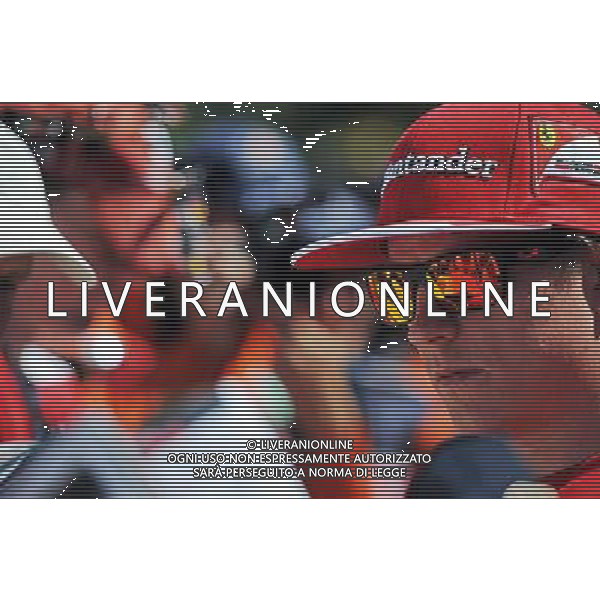 Kimi Raikkonen (FIN) Ferrari signs autographs for the fans. 23.05.2014. Formula 1 World Championship, Rd 6, Monaco Grand Prix, Monte Carlo, Monaco, Friday. - www.xpbimages.com, EMail: requests@xpbimages.com - copy of publication required for printed pictures. Every used picture is fee-liable. Â© Copyright: Price / XPB Images /AGENZIA ALDO LIVERANI SAS - ITALY ONLY - EDITORIAL USE ONLY - GP MONACO F1 PROVE LIBERE
