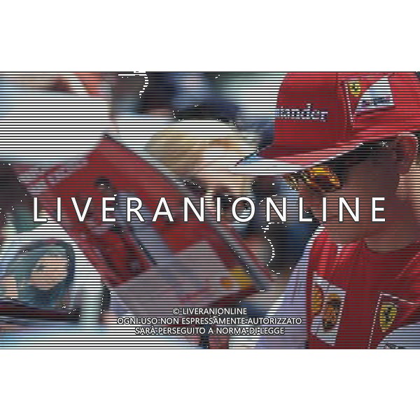 Kimi Raikkonen (FIN) Ferrari signs autographs for the fans. 23.05.2014. Formula 1 World Championship, Rd 6, Monaco Grand Prix, Monte Carlo, Monaco, Friday. - www.xpbimages.com, EMail: requests@xpbimages.com - copy of publication required for printed pictures. Every used picture is fee-liable. Â© Copyright: Price / XPB Images /AGENZIA ALDO LIVERANI SAS - ITALY ONLY - EDITORIAL USE ONLY - GP MONACO F1 PROVE LIBERE