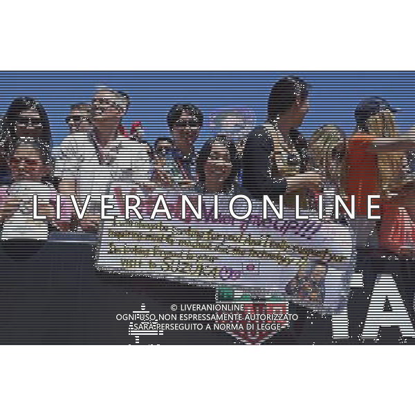 A banner for Sebastian Vettel (GER) Red Bull Racing from a Japanese fan. 23.05.2014. Formula 1 World Championship, Rd 6, Monaco Grand Prix, Monte Carlo, Monaco, Friday. - www.xpbimages.com, EMail: requests@xpbimages.com - copy of publication required for printed pictures. Every used picture is fee-liable. Â© Copyright: Price / XPB Images /AGENZIA ALDO LIVERANI SAS - ITALY ONLY - EDITORIAL USE ONLY - GP MONACO F1 PROVE LIBERE