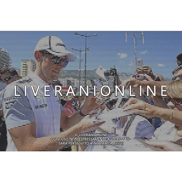 Jenson Button (GBR) McLaren signs autographs for the fans. 23.05.2014. Formula 1 World Championship, Rd 6, Monaco Grand Prix, Monte Carlo, Monaco, Friday. - www.xpbimages.com, EMail: requests@xpbimages.com - copy of publication required for printed pictures. Every used picture is fee-liable. Â© Copyright: Price / XPB Images /AGENZIA ALDO LIVERANI SAS - ITALY ONLY - EDITORIAL USE ONLY - GP MONACO F1 PROVE LIBERE
