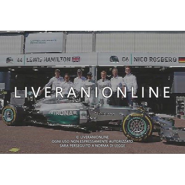 Lewis Hamilton (GBR) Mercedes AMG F1 and team mate Nico Rosberg (GER) Mercedes AMG F1 with Dr. Dieter Zetsche (GER) Daimler AG CEO and Toto Wolff (GER) Mercedes AMG F1 Shareholder and Executive Director as Petronas extend their title sponsorship with the Mercedes AMG F1 Team. 24.05.2014. Formula 1 World Championship, Rd 6, Monaco Grand Prix, Monte Carlo, Monaco, Qualifying Day - www.xpbimages.com, EMail: requests@xpbimages.com - copy of publication required for printed pictures. Every used picture is fee-liable. © Copyright: Batchelor / XPB Images AG ALDO LIVERANI SAS ONLY ITALY