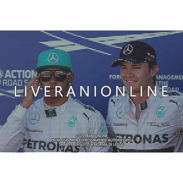 Lewis Hamilton (GBR), Mercedes AMG F1 Team and Nico Rosberg (GER), Mercedes AMG F1 Team 24.05.2014. Formula 1 World Championship, Rd 6, Monaco Grand Prix, Monte Carlo, Monaco, Qualifying Day - www.xpbimages.com, EMail: requests@xpbimages.com - copy of publication required for printed pictures. Every used picture is fee-liable. © Copyright: Charniaux / XPB Images AG ALDO LIVERANI SAS ONLY ITALY