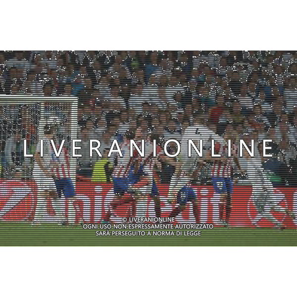 Real Madrid\'s Sergio Ramos scores his sides equalising goal to make the score 1-1 Photographer Ian Cook/CameraSport Football - UEFA Champions League Final 2014 - Real Madrid v Atletico Madrid - Saturday 24th May 2014 - Stadium of Light - Lisbon - Portugal © CameraSport - 43 Linden Ave. Countesthorpe. Leicester. England. LE8 5PG - Tel: +44 (0) 116 277 4147 - admin@camerasport.com - www.camerasport.com /AGENZIA ALDO LIVERANI SAS - ITALY ONLY - Real Madrid - Atletico Madrid UEFA Champions League 2013/2014 Finale Lisbona (Portogallo) - 24.05.2014