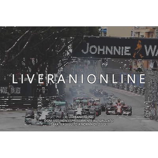 Nico Rosberg (GER) Mercedes AMG F1 W05 leads at the start of the race. 25.05.2014. Formula 1 World Championship, Rd 6, Monaco Grand Prix, Monte Carlo, Monaco, Race Day. - www.xpbimages.com, EMail: requests@xpbimages.com - copy of publication required for printed pictures. Every used picture is fee-liable. © Copyright: Charniaux / XPB Images ITALY ONLY - GP MONACO F1 GARA /AGENZIA ALDO LIVERANI SAS - ITALY ONLY - EDITORIAL USE ONLY
