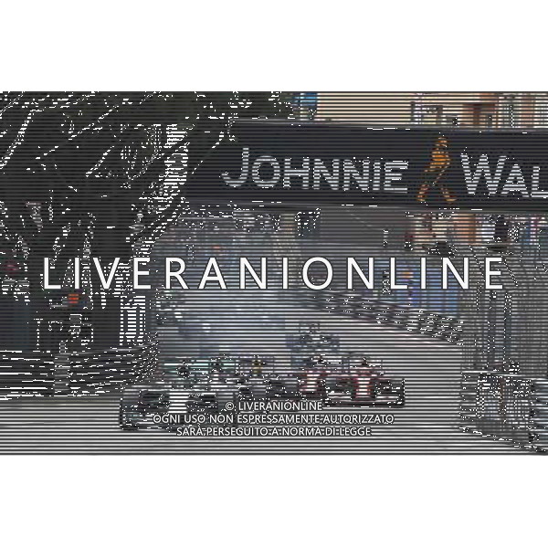 Nico Rosberg (GER) Mercedes AMG F1 W05 leads at the start of the race. 25.05.2014. Formula 1 World Championship, Rd 6, Monaco Grand Prix, Monte Carlo, Monaco, Race Day. - www.xpbimages.com, EMail: requests@xpbimages.com - copy of publication required for printed pictures. Every used picture is fee-liable. © Copyright: Moy / XPB Images ITALY ONLY - GP MONACO F1 GARA /AGENZIA ALDO LIVERANI SAS - ITALY ONLY - EDITORIAL USE ONLY