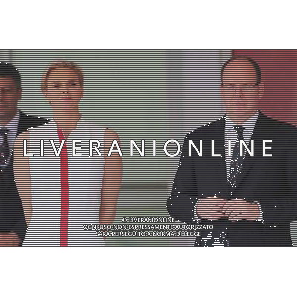 HSH Prince Albert of Monaco (MON) with his wife Princess Charlene of Monaco (RSA) on the podium. 25.05.2014. Formula 1 World Championship, Rd 6, Monaco Grand Prix, Monte Carlo, Monaco, Race Day. - www.xpbimages.com, EMail: requests@xpbimages.com - copy of publication required for printed pictures. Every used picture is fee-liable. © Copyright: Moy / XPB Images ©/AGENZIA ALDO LIVERANI SAS - ITALY ONLY - EDITORIAL USE ONLY - GP MONACO F1 GARA
