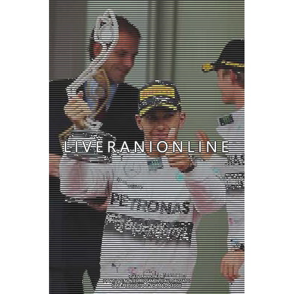 Lewis Hamilton (GBR) Mercedes AMG F1 celebrates his second position on the podium. 25.05.2014. Formula 1 World Championship, Rd 6, Monaco Grand Prix, Monte Carlo, Monaco, Race Day. - www.xpbimages.com, EMail: requests@xpbimages.com - copy of publication required for printed pictures. Every used picture is fee-liable. © Copyright: Moy / XPB Images ©/AGENZIA ALDO LIVERANI SAS - ITALY ONLY - EDITORIAL USE ONLY - GP MONACO F1 GARA