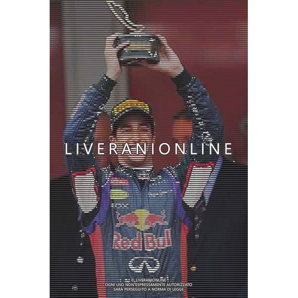 Daniel Ricciardo (AUS) Red Bull Racing celebrates his third position on the podium. 25.05.2014. Formula 1 World Championship, Rd 6, Monaco Grand Prix, Monte Carlo, Monaco, Race Day. - www.xpbimages.com, EMail: requests@xpbimages.com - copy of publication required for printed pictures. Every used picture is fee-liable. © Copyright: Moy / XPB Images ©/AGENZIA ALDO LIVERANI SAS - ITALY ONLY - EDITORIAL USE ONLY - GP MONACO F1 GARA