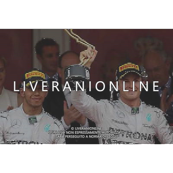 Nico Rosberg (GER), Mercedes AMG F1 Team and Lewis Hamilton (GBR), Mercedes AMG F1 Team 25.05.2014. Formula 1 World Championship, Rd 6, Monaco Grand Prix, Monte Carlo, Monaco, Race Day. - www.xpbimages.com, EMail: requests@xpbimages.com - copy of publication required for printed pictures. Every used picture is fee-liable. © Copyright: Charniaux / XPB Images ©/AGENZIA ALDO LIVERANI SAS - ITALY ONLY - EDITORIAL USE ONLY - GP MONACO F1 GARA