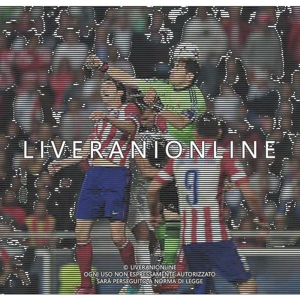 (140525) -- LISBON, May 25, 2014 () -- Real Madrid\'s goalkeeper Iker Casillas (Top) fights for the ball during the UEFA Champions League Final Real Madrid vs Atletico de Madrid at Luz stadium in Lisbon, capital of Portugal, on May 24, 2014. Real Madrid won 4-1. (/Zhang Liyun) ©PHOTOSHOT/AGENZIA ALDO LIVERANI SAS - ITALY ONLY - EDITORIAL USE ONLY