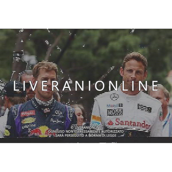(L to R): Sebastian Vettel (GER) Red Bull Racing and Jenson Button (GBR) McLaren, pay their respects to Sir Jack Brabham (AUS) on the grid. 25.05.2014. Formula 1 World Championship, Rd 6, Monaco Grand Prix, Monte Carlo, Monaco, Race Day. - www.xpbimages.com, EMail: requests@xpbimages.com - copy of publication required for printed pictures. Every used picture is fee-liable. © Copyright: Batchelor / XPB Images AG ALDO LIVERANI SAS ONLY ITALY