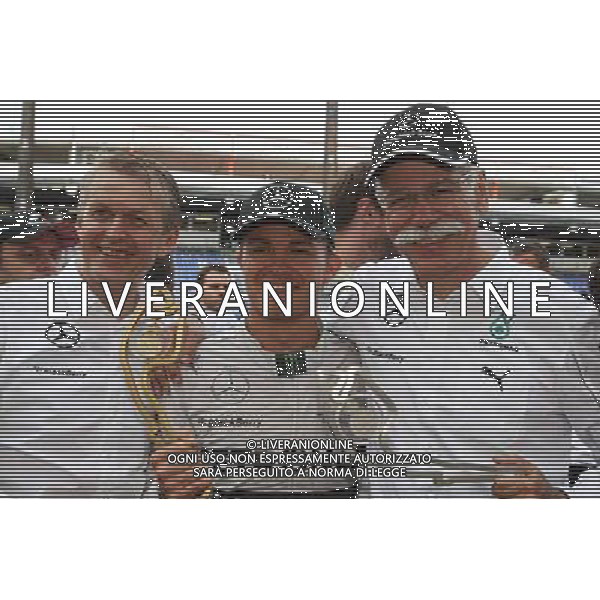 Race winner Nico Rosberg (GER) Mercedes AMG F1 W05 celebrates with Dr. Dieter Zetsche (GER) Daimler AG CEO (Right). 25.05.2014. Formula 1 World Championship, Rd 6, Monaco Grand Prix, Monte Carlo, Monaco, Race Day. - www.xpbimages.com, EMail: requests@xpbimages.com - copy of publication required for printed pictures. Every used picture is fee-liable. © Copyright: Schaber / XPB Images AG ALDO LIVERANI SAS ONLY ITALY