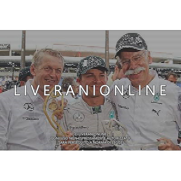 Race winner Nico Rosberg (GER) Mercedes AMG F1 W05 celebrates with Dr. Dieter Zetsche (GER) Daimler AG CEO (Right). 25.05.2014. Formula 1 World Championship, Rd 6, Monaco Grand Prix, Monte Carlo, Monaco, Race Day. - www.xpbimages.com, EMail: requests@xpbimages.com - copy of publication required for printed pictures. Every used picture is fee-liable. © Copyright: Schaber / XPB Images AG ALDO LIVERANI SAS ONLY ITALY