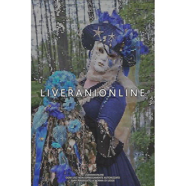 (140524) -- TALLINN, May 24, 2014 () -- Fancy-dressers in constume is seen in the annual Carnival of Venice at the Park Lowenruh in Tallinn, Estonia, May 24, 2014. (/Viktor Vesterinen) ©PHOTOSHOT/AGENZIA ALDO LIVERANI SAS - ITALY ONLY - EDITORIAL USE ONLY - Persone con maschere e in constume durante l\'annuale Carnevale di Venezia presso il Parco Lowenruh a Tallinn, in Estonia, 24 maggio 2014