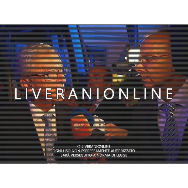 (140526) -- BRUSSELS, May 26, 2014 () -- Jean-Claude Juncker (L), candidate of the center-right European People\'s Party for the position of the European commission president, speaks to a reporter in Brussels, Belgium, on May 25, 2014. Official estimation on Sunday showed that center-right European People\'s Party (EPP) group led the 2014 European Parliament elections, gaining 211 out of a total of 751 seats, followed by the Progressive Alliance of Socialists and Democrats group that garnered 193 seats. (/Gong Bing) ©photoshot/AGENZIA ALDO LIVERANI SAS - ITALY ONLY - EDITORIAL USE ONLY - La notte elettorale 2014 - Le elezioni europee, dal 22 al 25 di maggio, formeranno il nuovo Parlamento europeo per i prossimi cinque anni presso la sede a Bruxelles, in Belgio