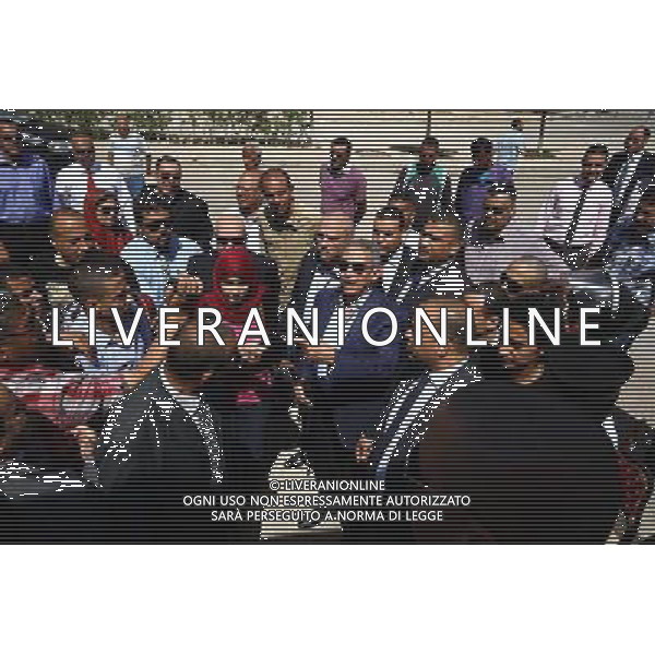 (140526) -- CAIRO, May 26, 2014 () -- Amr Moussa (C), head of the 50-member constitution-draft panel, speaks to people at a polling station in Cairo, capital of Egypt, May 26, 2014. Egypt held presidential election on Monday. (/Ahmed Gomaa) (yc) Â©photoshot/AGENZIA ALDO LIVERANI SAS - ITALY ONLY - EDITORIAL USE ONLY - VOTAZIONI ELEZIONI PRESIDENZIALI IN EGITTO 2014