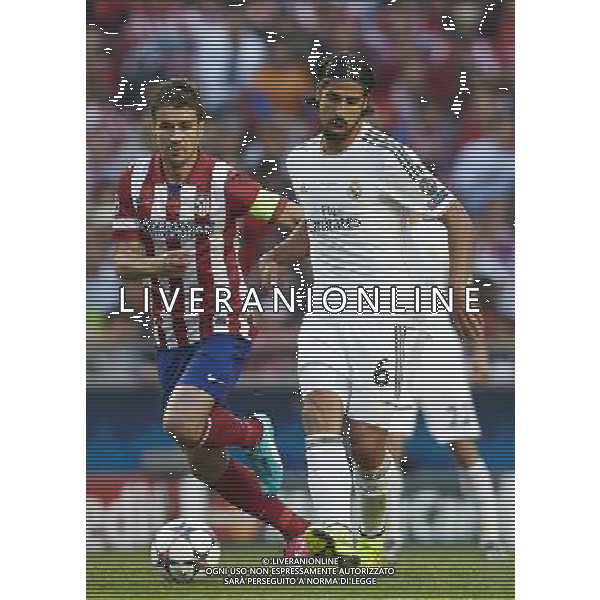 LISBON, PORTUGAL - MAY 24: Khedira (R) of Real Madrid CF competes for the ball with Gabi of Atletico de Madrid during the UEFA Champions League Final match between Real Madrid CF and Atletico de Madrid at Estadio da Luz on May 24, 2014 in Lisbon, Portugal. (Photo by David Aliaga/Newspix) --- Newspix.pl SPAIN AND POLAND OUT!!! AG ALDO LIVERANI SAS ONLY ITALY